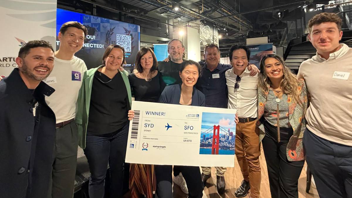 Roam Technologies founder Shan-Shan Wang with Startup World Cup Sydney organisers and supporters after winning the Sydney regional final.