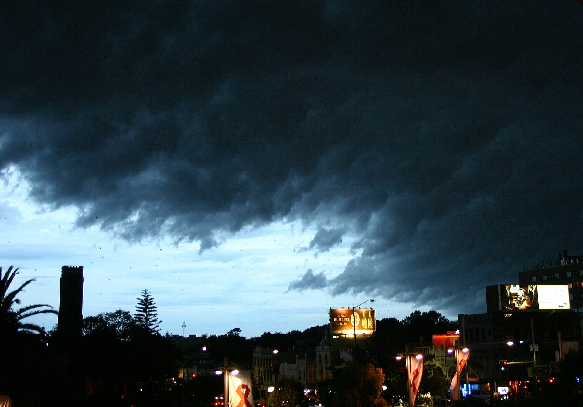 Storm cloud over Sydney. The Bureau's Sydney location forecast showed showers for Sunday while the local page showed no warning for Sydney.